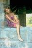 Woman sitting on stone wall.jpg