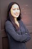 Woman smiling against garage door.jpg
