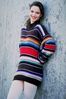 Woman smiling in striped sweater.jpg