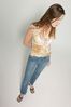 Woman standing in jeans a82.jpg