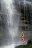 Woman standing in waterfall spray an 2.jpg