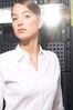 Woman standing next to computer server uid 1281970.jpg
