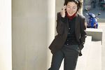 Woman standing outside talking on her cell phone uid 1455099.jpg