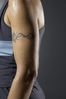 Woman tattooed arm.jpg