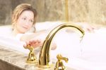 Woman turning off faucet with her toes.jpg