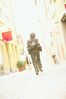 Woman walking away on a sidewalk uid 1455041.jpg