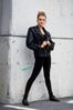 Woman wearing black leather jacket.jpg