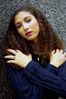 Woman wearing blue sweater.jpg