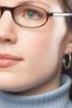 Woman wearing eyeglasses 1 c103127.jpg
