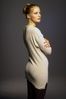Woman wearing long white sweater.jpg