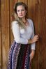 Woman wearing patterned skirt.jpg