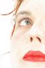 Woman wearing white facial mask.jpg