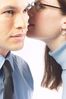 Woman whispering secret into man ear 2.jpg