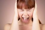 Woman with bare shoulders having temper tantrum.jpg