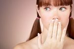 Woman with bare shoulders looking surprised.jpg