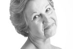Woman with bare shoulders smiling uid 1284794.jpg