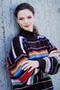 Woman with crossed arms in striped sweater.jpg