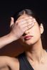 Woman with hand over forehead uid 1426300.jpg