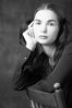 Woman with lip ring sitting in wooden chair 3.jpg