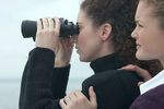 Women looking through binoculars uid 1283644.jpg