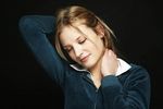 Young blonde woman with a black background uid 1453109.jpg