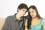 Young couple sitting on sofa.jpg
